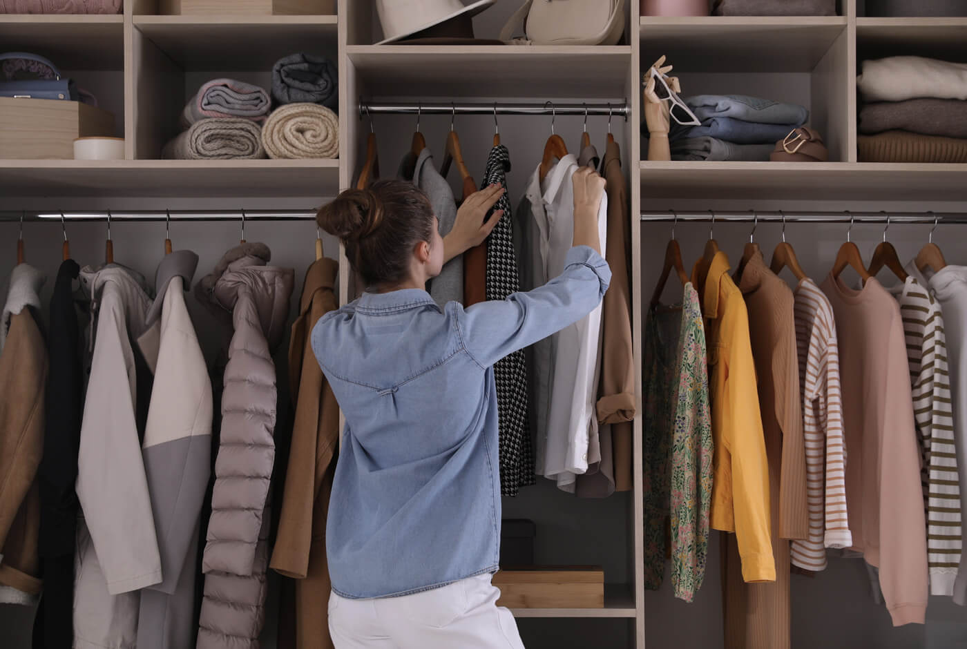 a woman standing in a closet